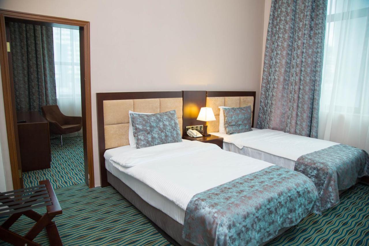 Ruma Port Hotel Bakoe Buitenkant foto